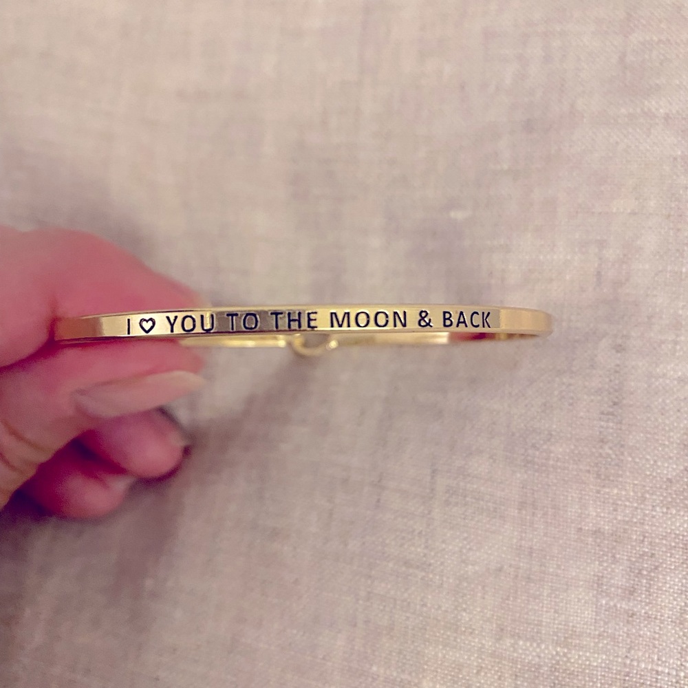 Brand new Love you to the Moon and Back gold plated bracelet.